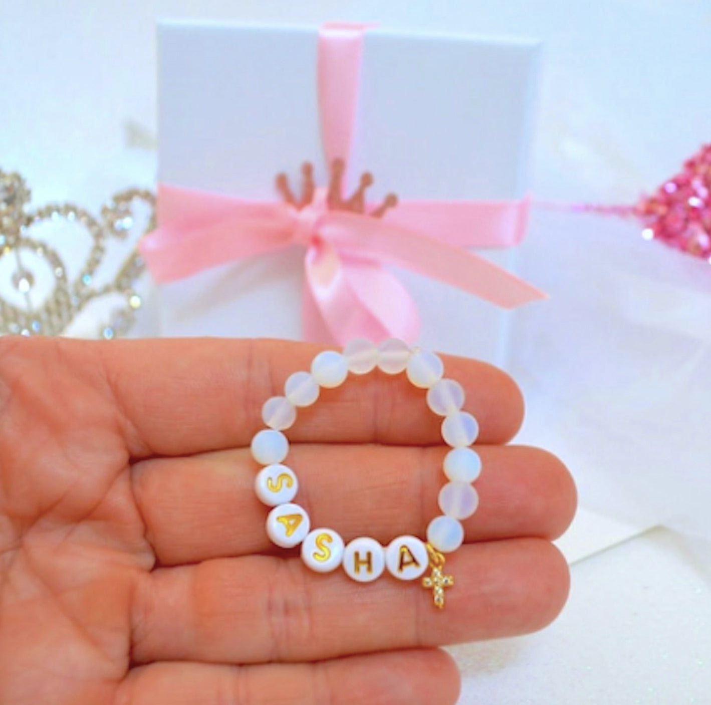 personalized sea opal baby bracelet with gold sparkly rhinestone cross, perfect baby shower gift