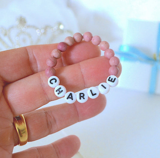 Personalized vibrant rhodonite gemstone baby bracelet for boys and girls, handmade jewelry perfect for baby showers or birthdays